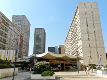 Olympia's pedestrian level, 30 feet above street level, and residential towers