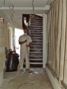 For the adults, it's clean-up-fix-up time.  This workman posed beside his newly-whitewashed wall in the Passages des Patriarches.